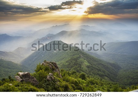 A mountain range at sunrise