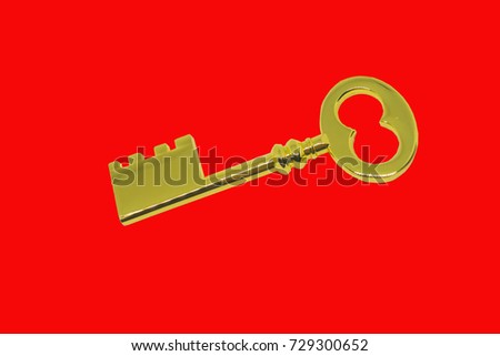 Key golden isolated on red background.