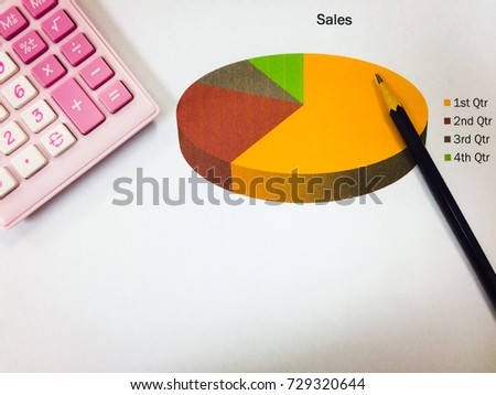 top view and copy space of office equipment and assessory on desk table with calculator, glasses, pencil and business graph