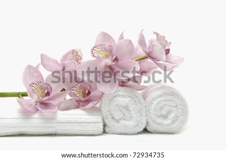 beautiful pink orchid on white towel Royalty-Free Stock Photo #72934735