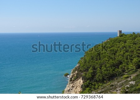 stone vigilance tower in a mountain near the sea in Peñiscola, landscape from Peniscola, Spain