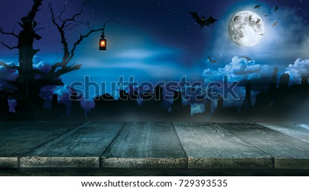 Spooky halloween background with empty wooden planks, dark horror background. Celebration theme, copyspace for text. Ideal for product placement Royalty-Free Stock Photo #729393535