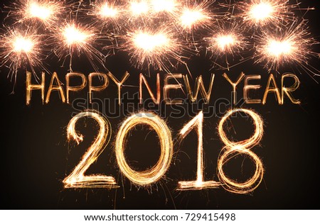 Happy new year 2018 written with Sparkle firework Royalty-Free Stock Photo #729415498