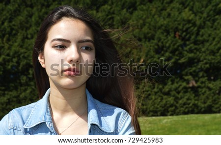 Young woman sad  in park