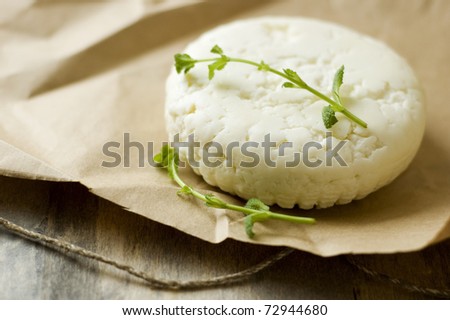 fresh feta cheese on wooden board Royalty-Free Stock Photo #72944680