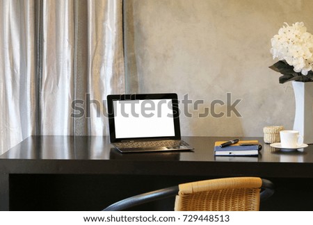 Laptop On the black desk In the office at home minimalism style loft cement wall in background Royalty-Free Stock Photo #729448513
