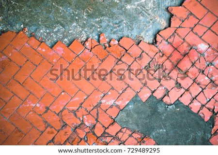 concrete wall with red brick
