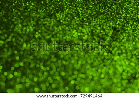 Green Glittering Lights Background