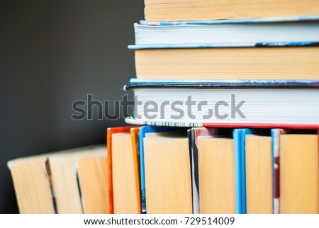 Many books on the shelf at bookstore or in the public library room. Royalty-Free Stock Photo #729514009