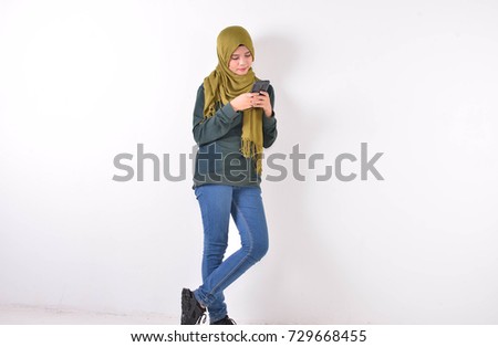 Hijab women with mobile phone