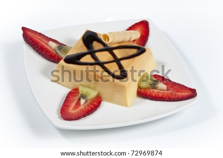 custard picture with strawberries rolled wafers and chocolate