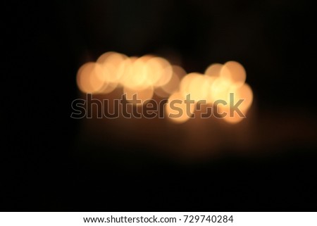 Create a bokeh picture from the candlelight mother's day.