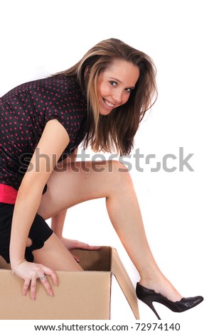 girl in the box isolated on white background