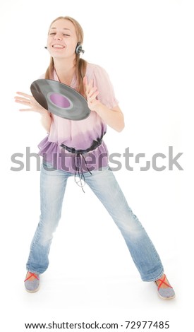 young girl with a vinyl record and headphones