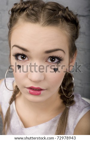 portrait of pretty girl in make up like doll