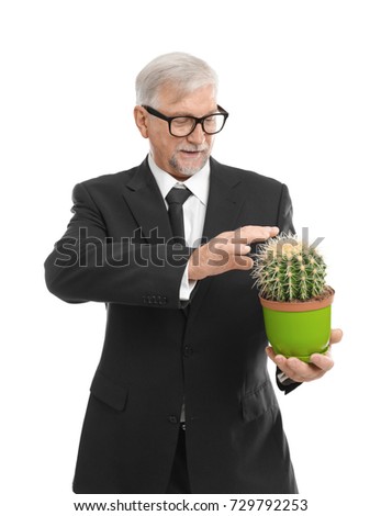 Elderly man with cactus on white background