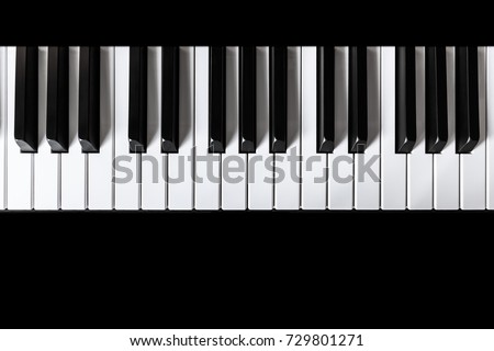 Piano and Piano keyboard with black backgrounds. Royalty-Free Stock Photo #729801271