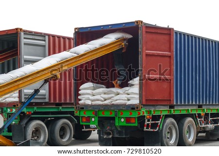 White sugar bags stuffing into a container for export isolated on white background. Distribution, Logistic Import Export, Trading, Shipment, Delivery concept. Royalty-Free Stock Photo #729810520