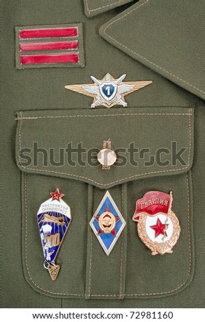 Russian military badges on the green uniform