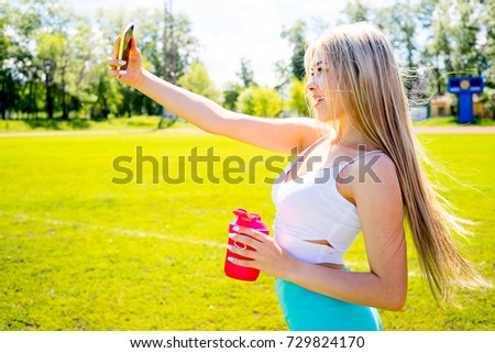 Girls taking selfies after yoga