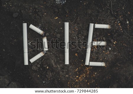 the word die written cigarettes. The dangers of Smoking. Anti tobacco a conceptual photo.