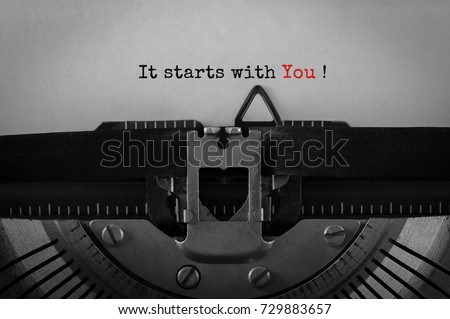 Text It starts with You typed on retro typewriter Royalty-Free Stock Photo #729883657