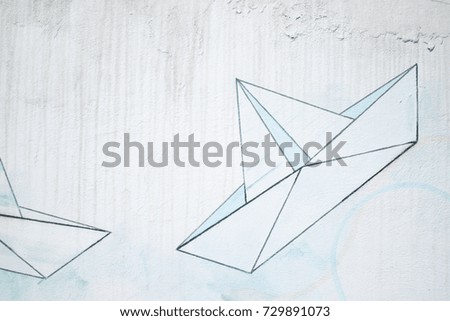background picture of a white wall with boat graffiti