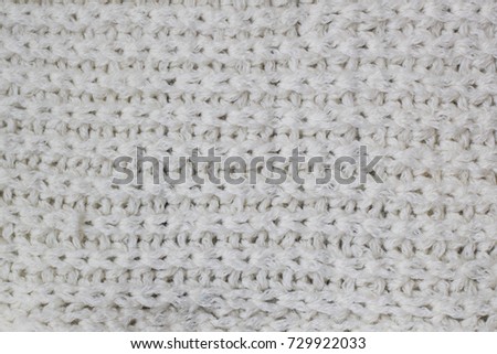 Sweater or scarf Pattern Of White Knitted Fabric Texture Background.