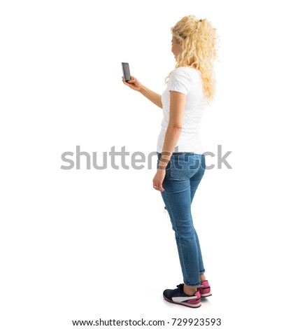 Woman taking picture with phone