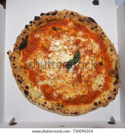 margherita aka margarita pizza traditional Italian food in a box
