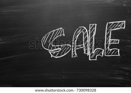 Sale text on chalkboard