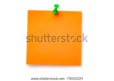 Orange sticker on green thumbtack. Isolated on white.