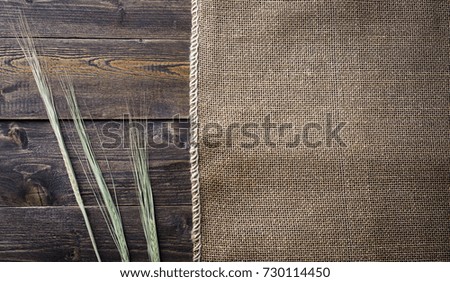 ears of burlap on a wooden table