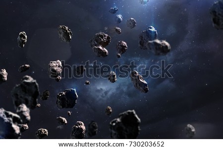 Meteorites. Deep space image, science fiction fantasy in high resolution ideal for wallpaper and print. Elements of this image furnished by NASA Royalty-Free Stock Photo #730203652