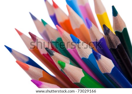 Pencils with rainbow colours. Artistic selective focus. Isolated on white background.