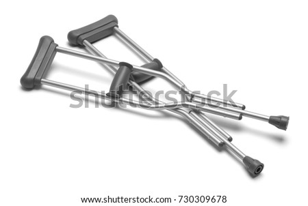 Pair of Crutches Isolated on a White Background. Royalty-Free Stock Photo #730309678