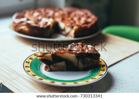 chocolate-apple cake  Royalty-Free Stock Photo #730313341