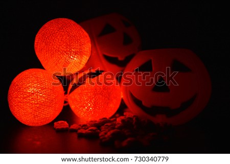 The concept of light on the night Halloween.Round lamp shape of pumpkin used to decorate with copy space for text.