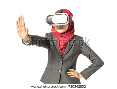 Veiled businesswoman wearing vr (Virtual Reality) box with white background. Technology conceptual.
