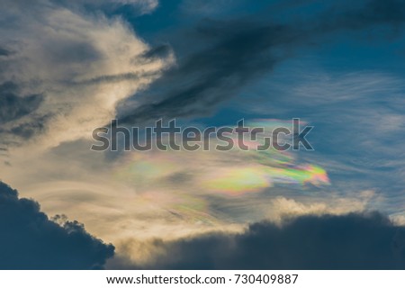 image of Irisation on blue sky and white cloud on day time for background usage.(horizontal).