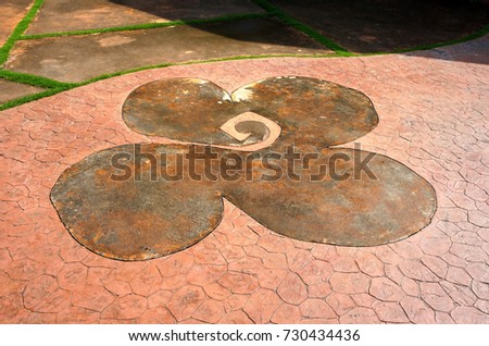 Beautiful ceramic tiles pattern on floor in garden
