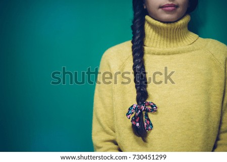 Girl with long natural hair, hairstyle braid