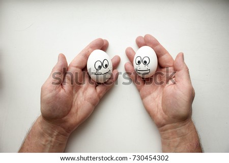 menu concept of proper nutrition. funny eggs smiling and hands of cook. horizontal sheet orientation