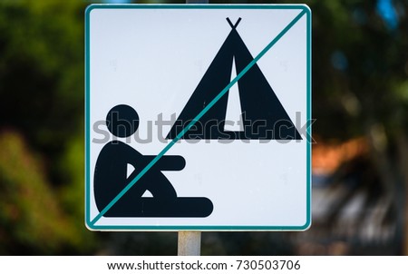 Green no camping allowed warning sign in Croatia. Green camping forbidden road sign. High resolution photo.