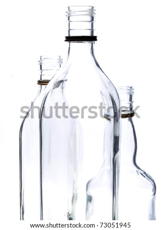 Photo bottles and glasses on a white background