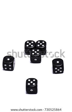 Black dices isolated on white