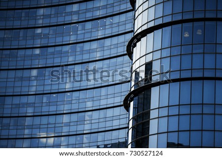 Corporate office building in Milan - detail in blue tones, business concept.