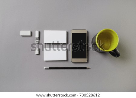 Photo of blank stationery on gray background. Template for placing your design. Mockup for ID. Top view.