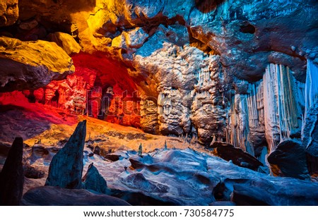 Cango Cave, amazing view on stalactites in colorful bright light, beautiful natural attraction, wonderful nature, touristic place, historical landmark, South Africa
