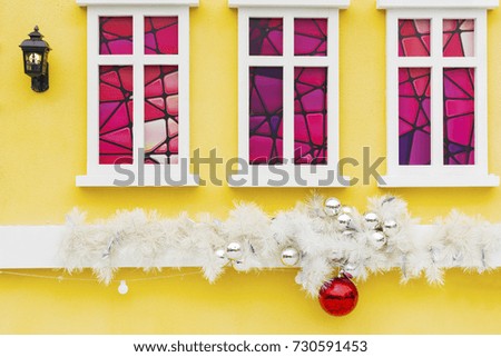 Christmas ball and decoration on wall